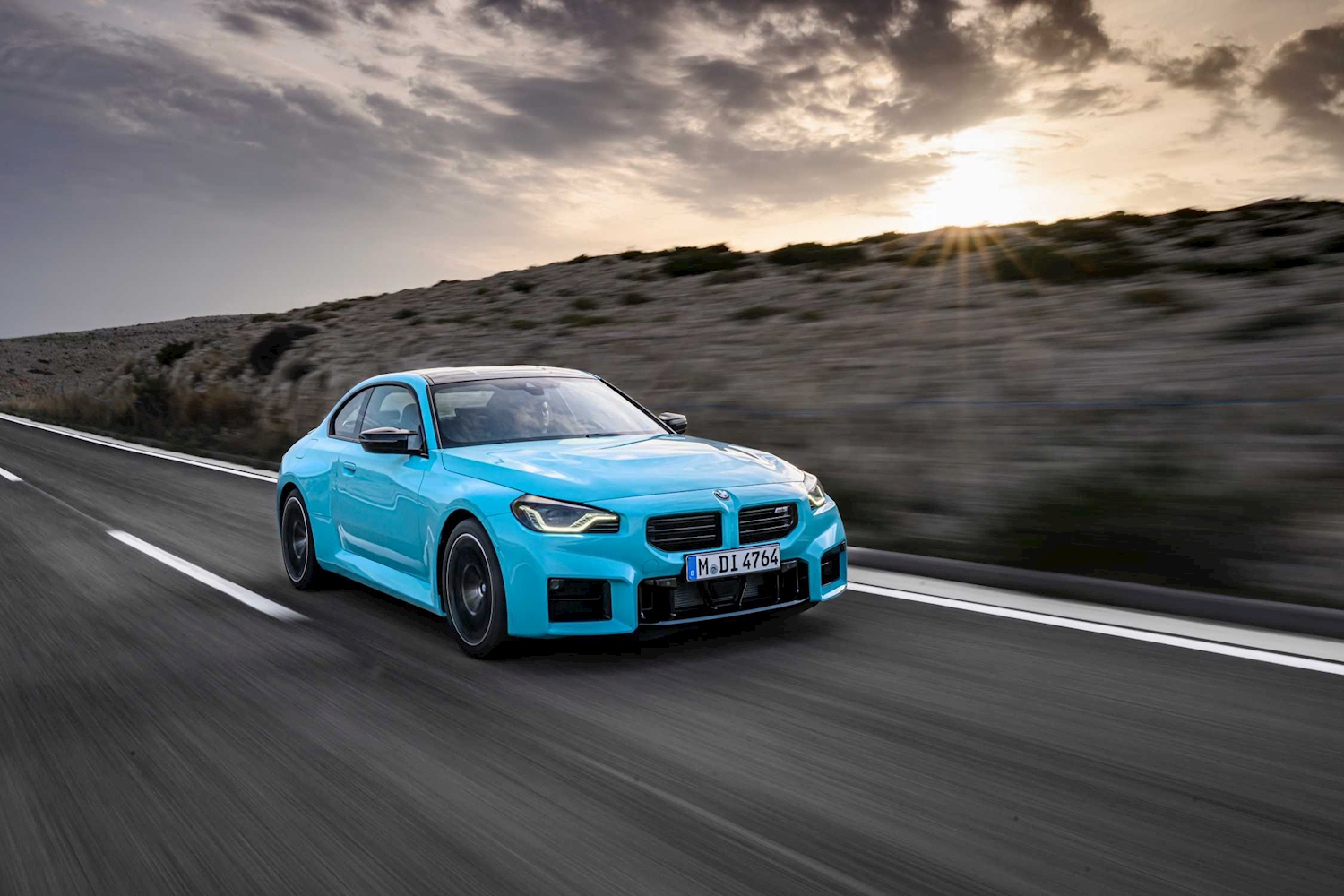Blue BMW M2 Coupe on the open road — the 2027 BMW M2 with M xDrive is available at BMW of Darien in Connecticut