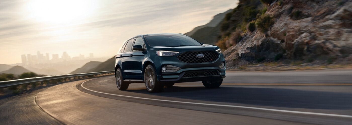 2024 Ford Edge driving by mountainside