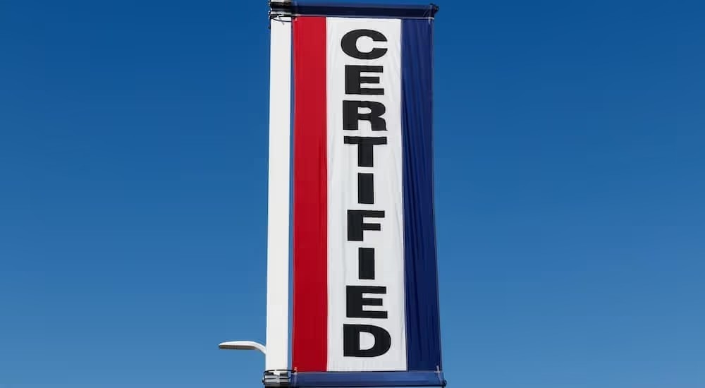 A 'certified' banner is shown at a certified pre-owned vehicle dealer.