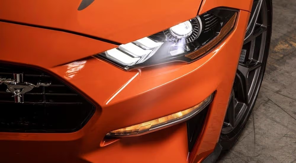A close up shows driver side headlight on a 2020 Ford Mustang High Performance.