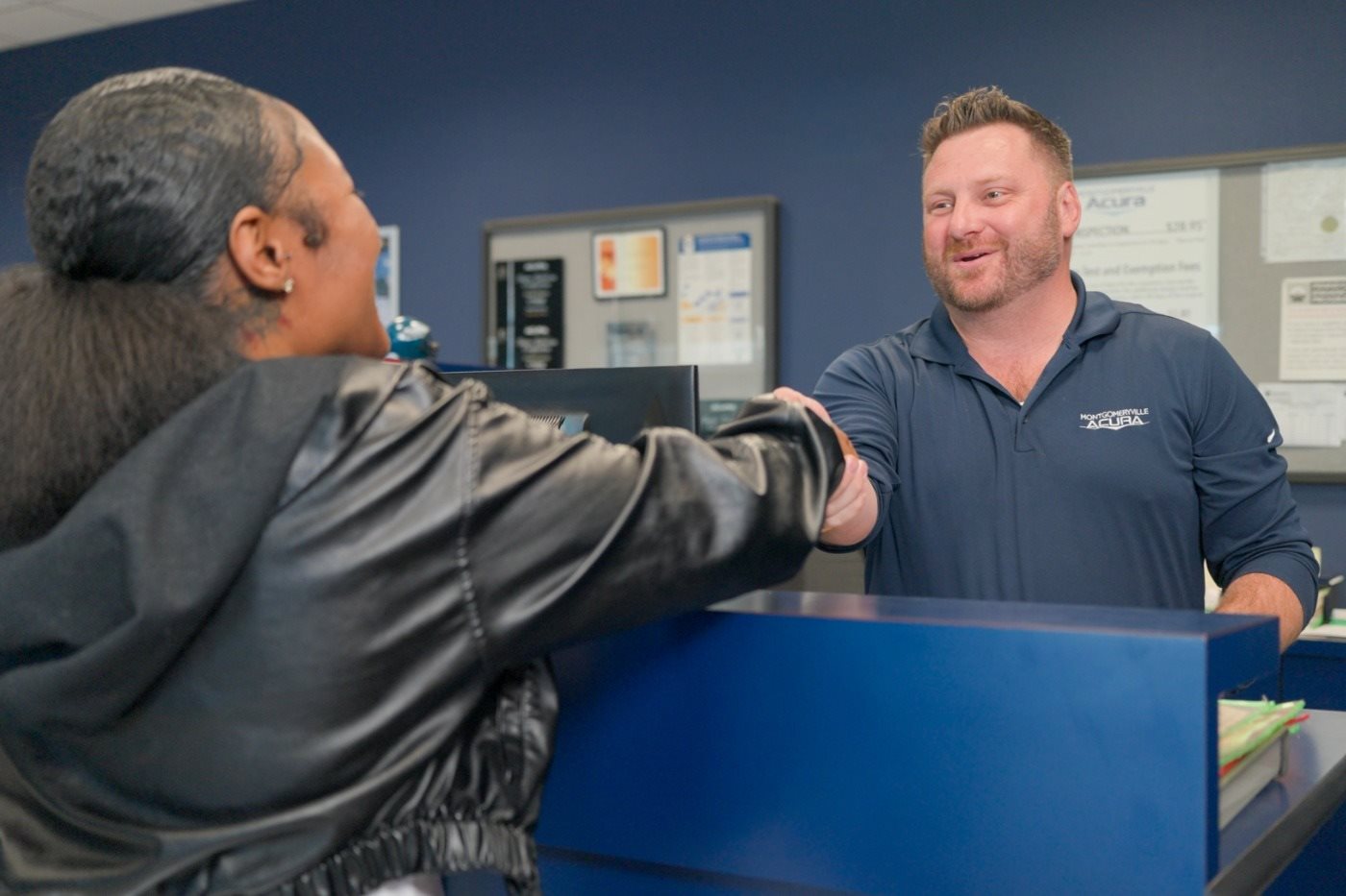 Customer and Employee Shaking Hands