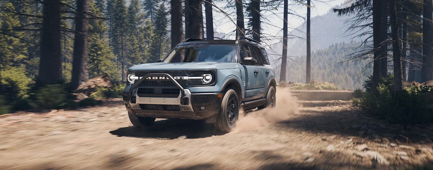 A gray 2025 Ford Bronco Sport off-roading on a trail