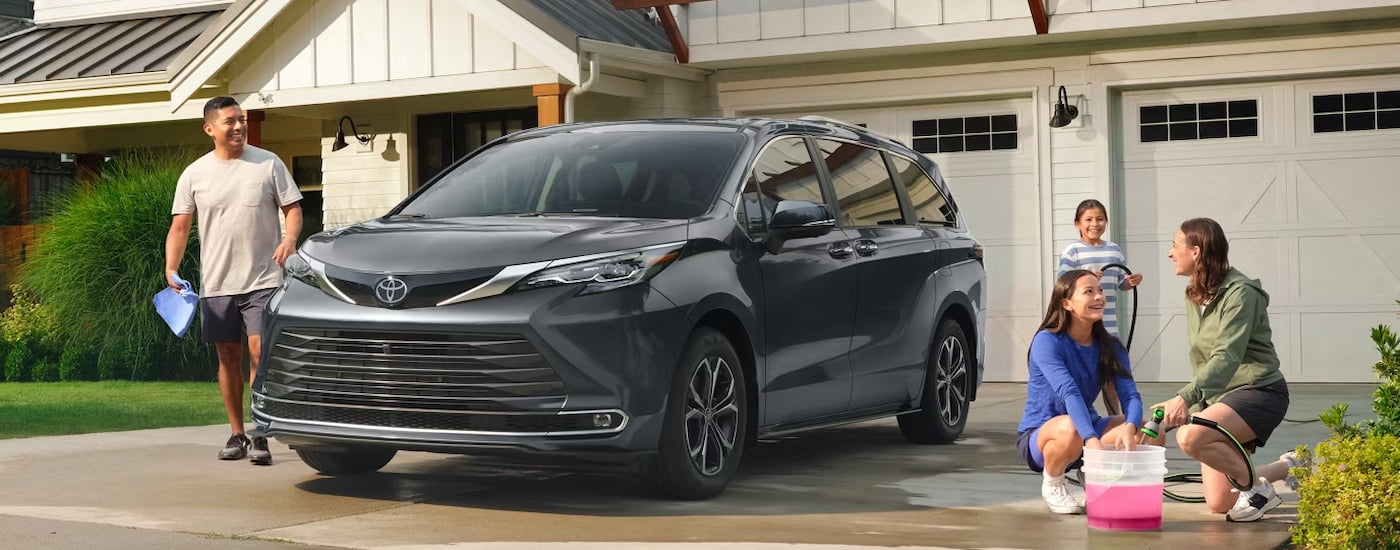 Grey 2026 Toyota Sienna parked on a driveway.