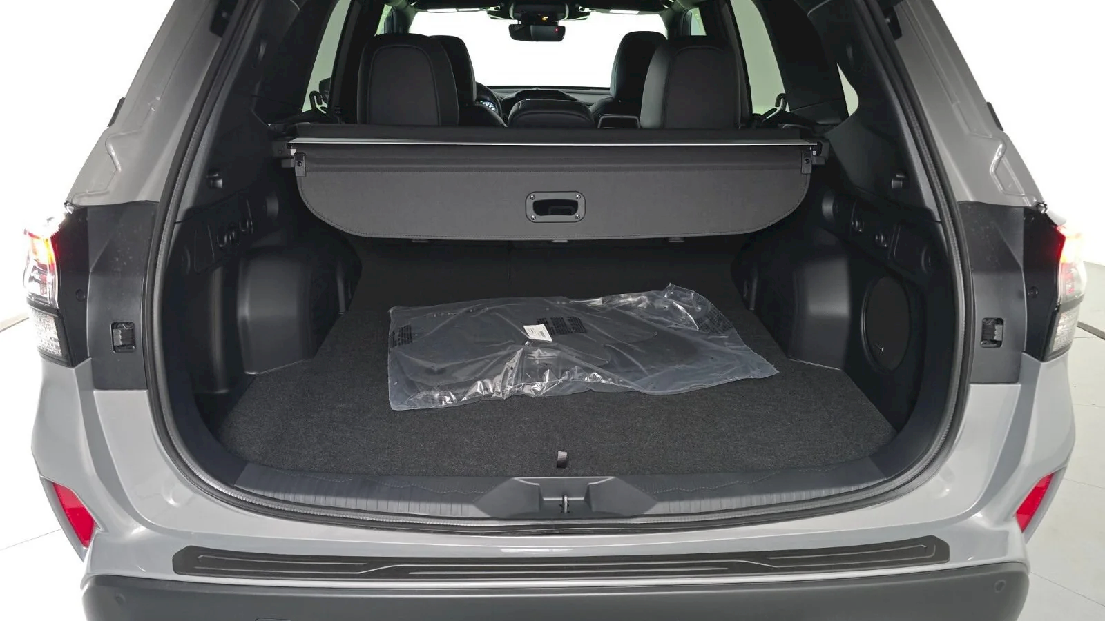 2026 Subaru Forester Sport at Findlay Subaru Prescott, open cargo area with the rear seats up (photo 7 of 10)