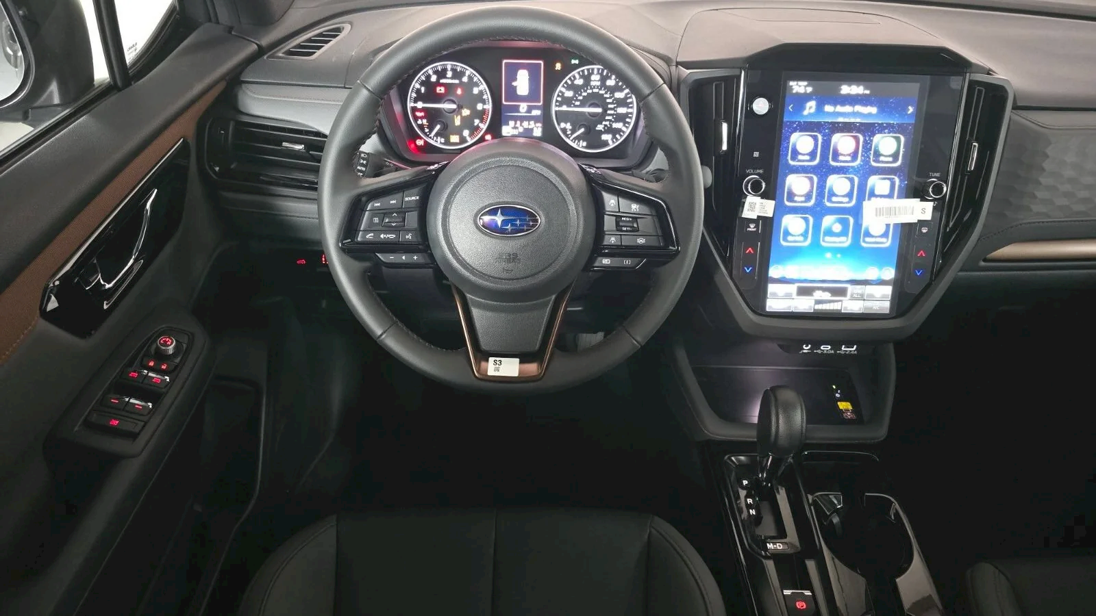 2026 Subaru Forester Sport at Findlay Subaru Prescott, driver's cockpit with steering wheel, gauges and touchscreen (photo 8 of 10)