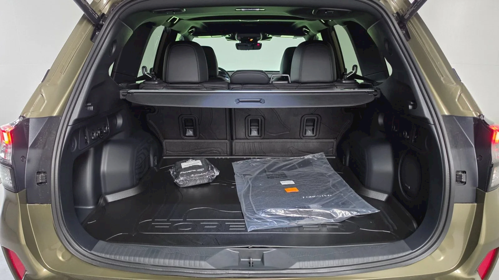 2026 Subaru Forester Limited at Findlay Subaru Prescott, open cargo area with the rear seats up (photo 9 of 11)