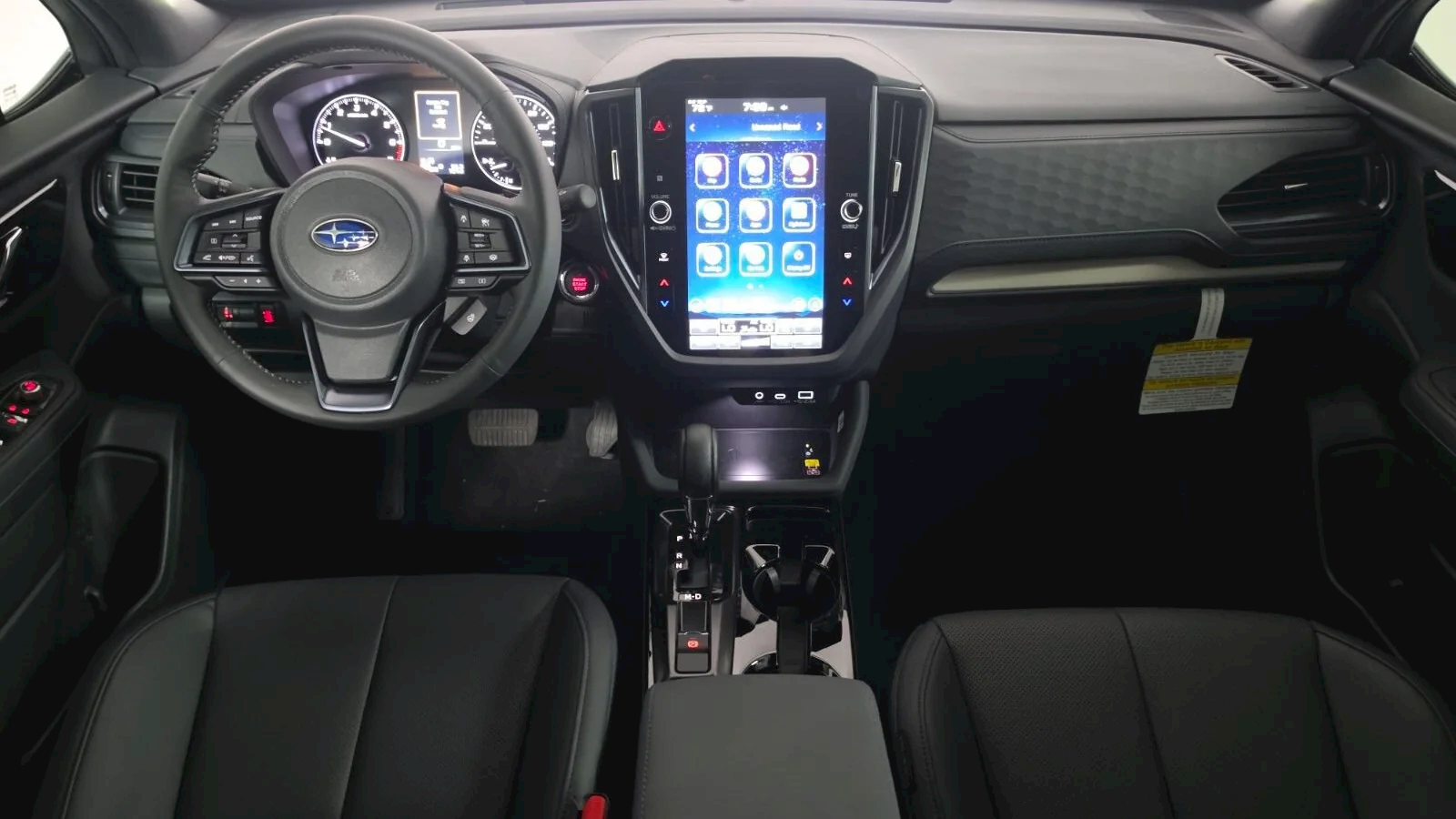 2026 Subaru Forester Limited at Findlay Subaru Prescott, front cabin with leather seating and the vertical touchscreen (photo 10 of 11)