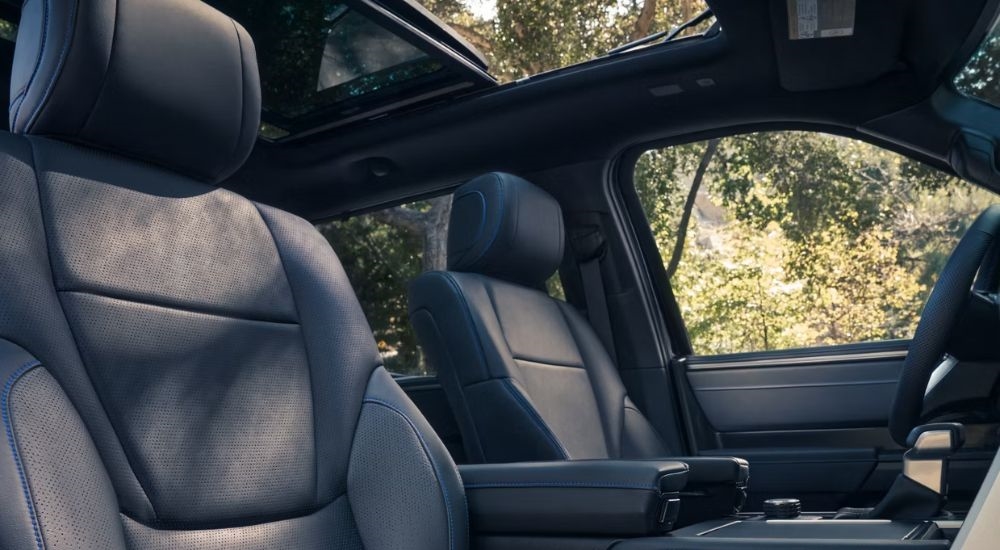 Interior view of black leather seats in a 2026 Toyota Tundra.