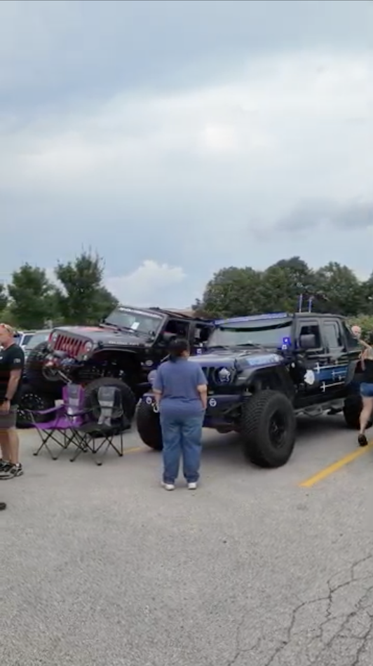 Customized Jeep Wranglers lined up during Texas Roadhouse Jeep Night in Naperville