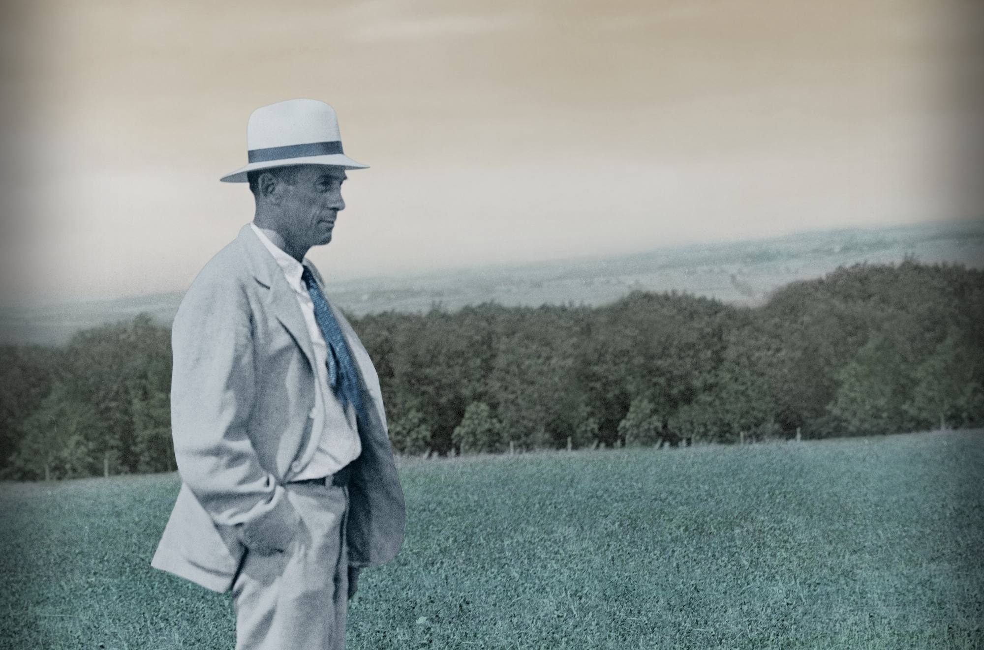 Harry J. Dahl standing in an open field on the campaign trail