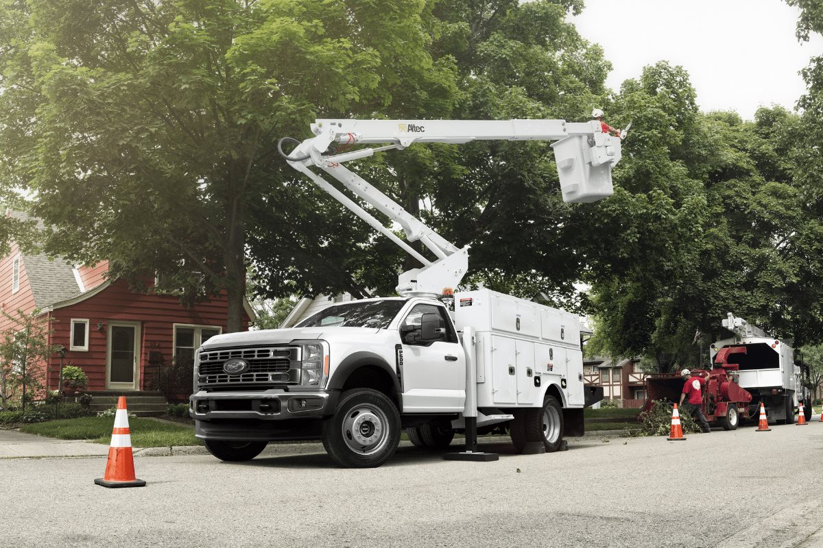 Ford Super Duty commercial truck with utility body and aerial lift for specialized work 
applications 