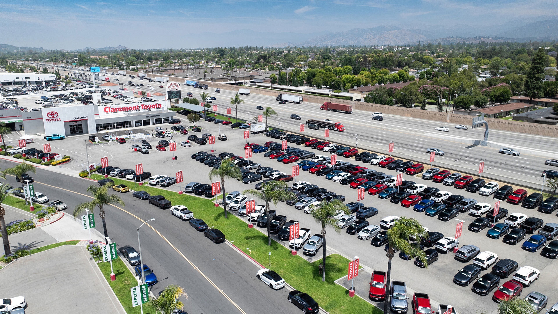 2026 Toyota Tacoma dealership exterior storefront at Claremont Toyota in Los Angeles County