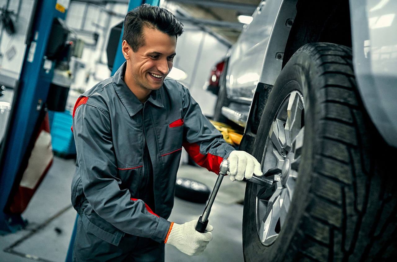 Technician installing new Subaru tires