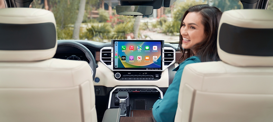 people inside a Toyota car