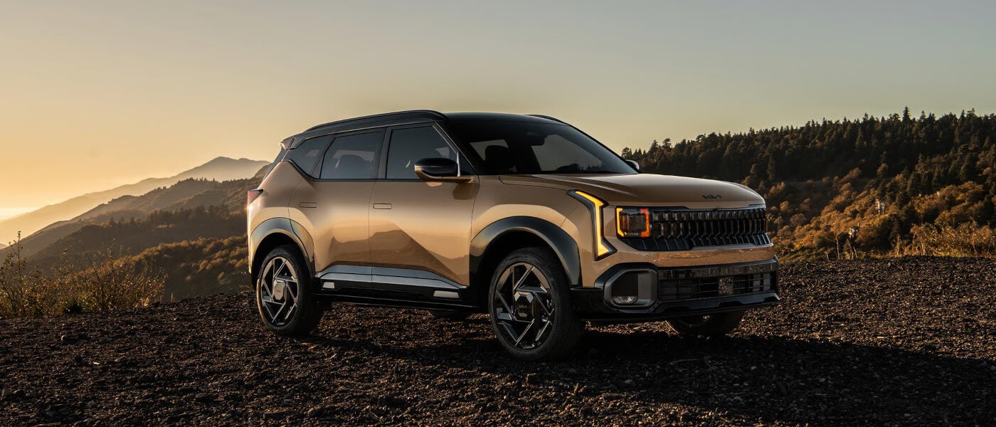 2027 Kia Seltos parked in mountains