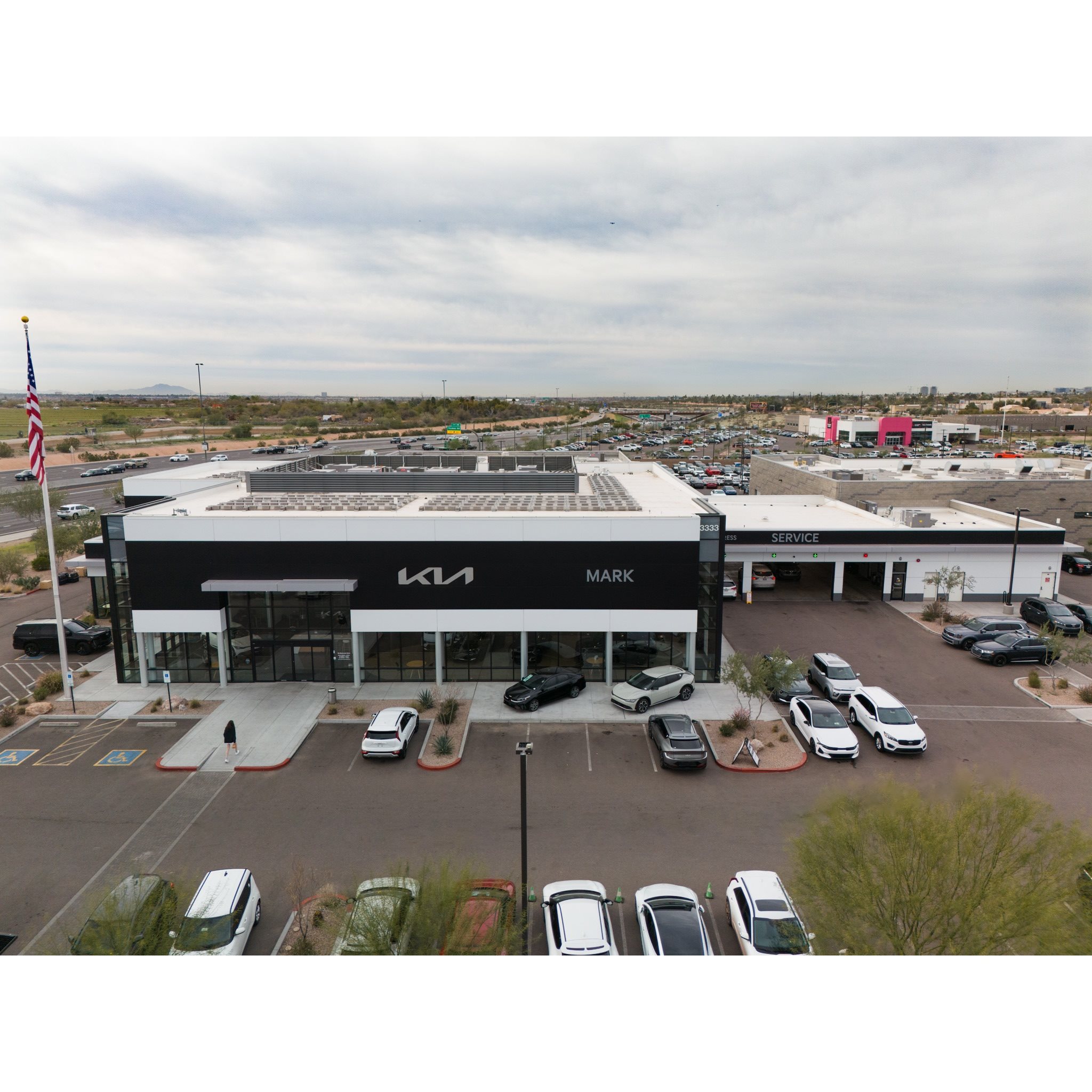 Mark Kia dealership showroom and lot in Scottsdale Arizona