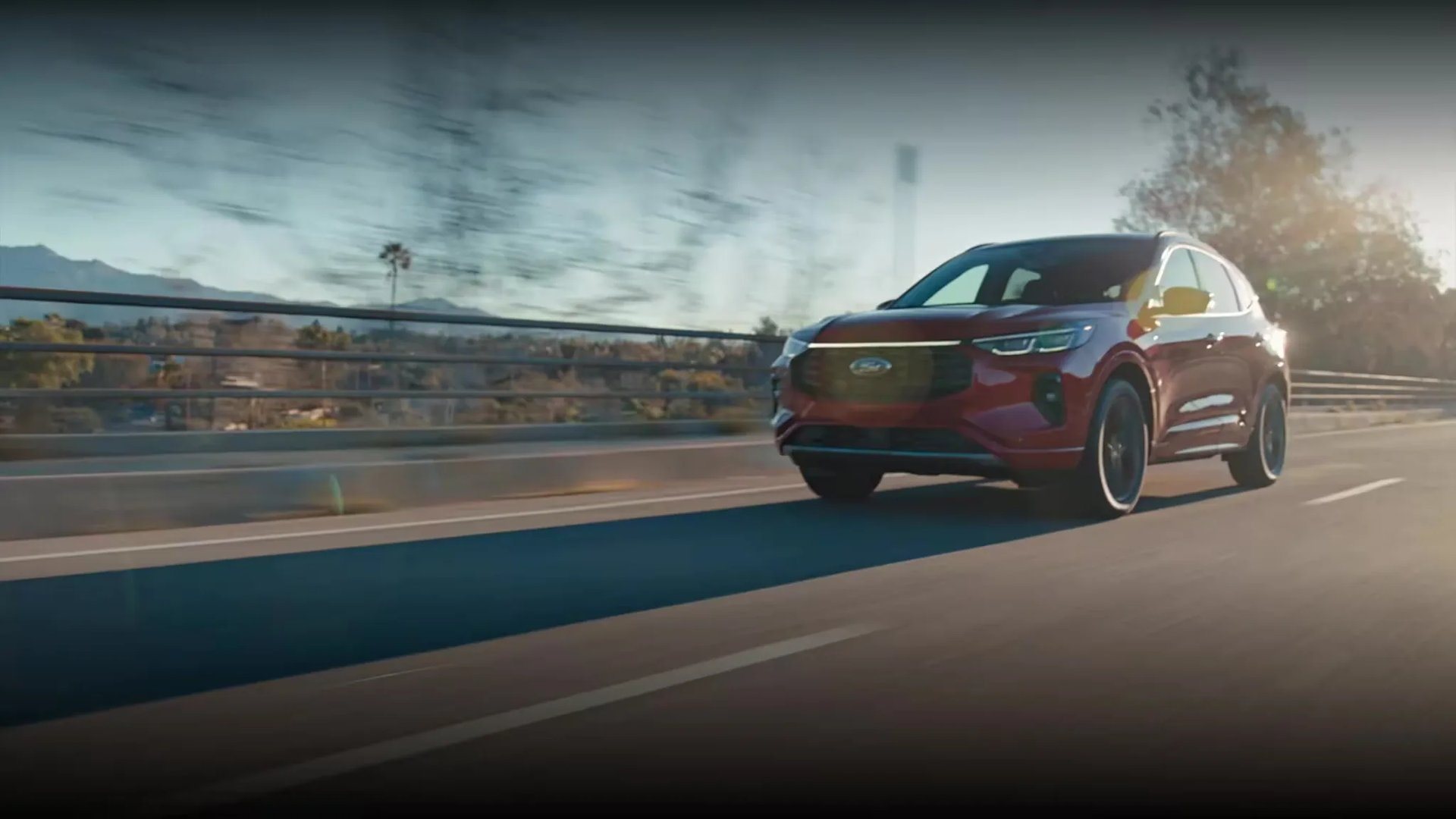 Ford Escape on the highway at dusk, the commuter SUV for the Oak Grove to Fort Campbell drive