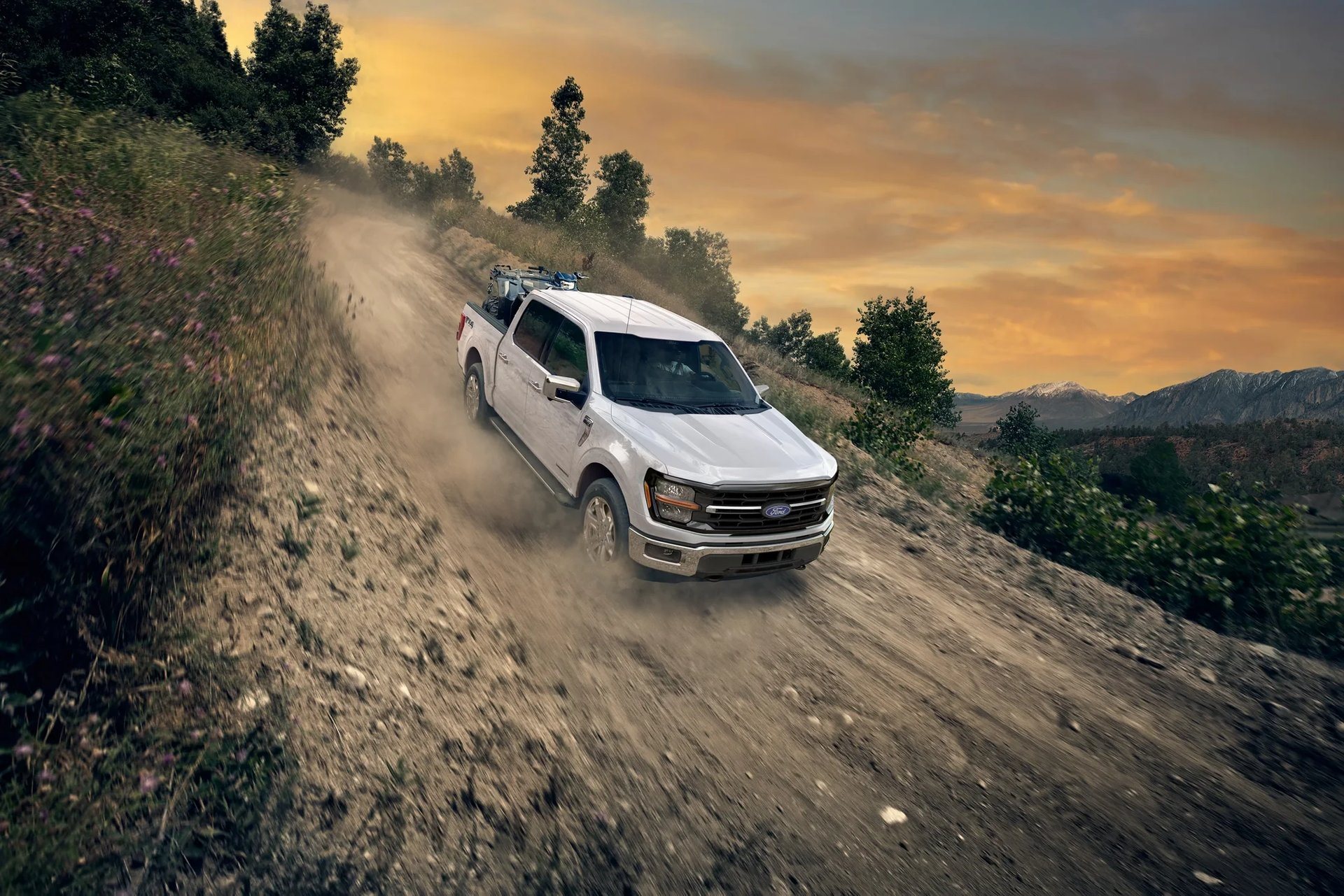 Ford F-150 FX4 climbing a dirt slope, the full-size truck Oak Grove KY buyers tow with