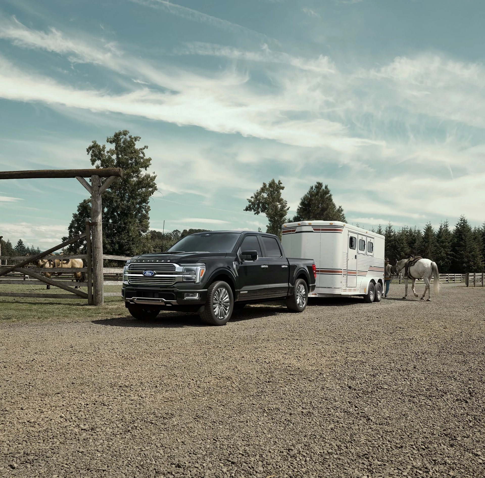 2026 Ford F-150 Platinum hitched to a trailer on gravel, the setup Fort Campbell families use for a PCS move