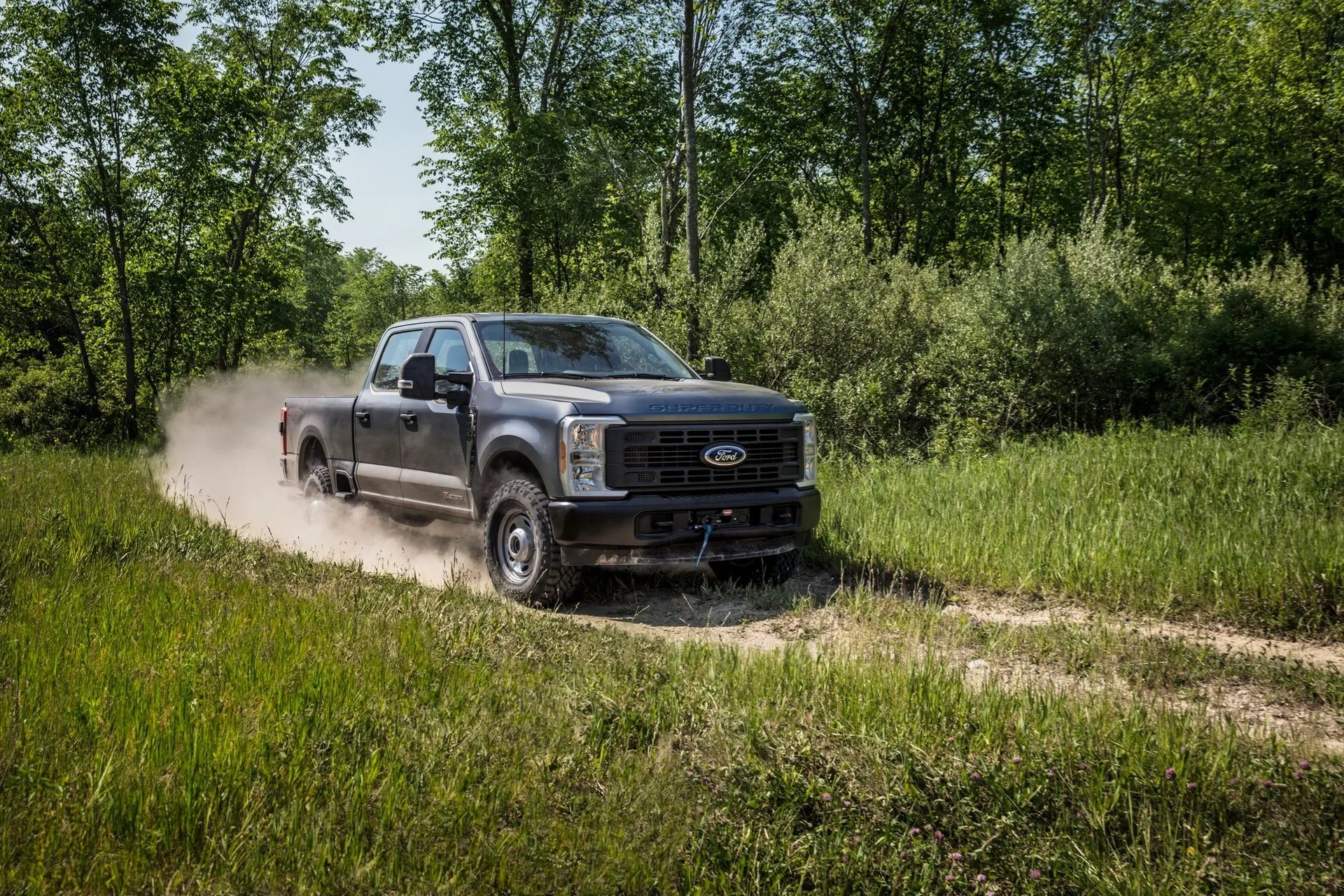 Ford Super Duty F-250 on a rough track, the heavy-duty truck for Oak Grove KY buyers who tow big