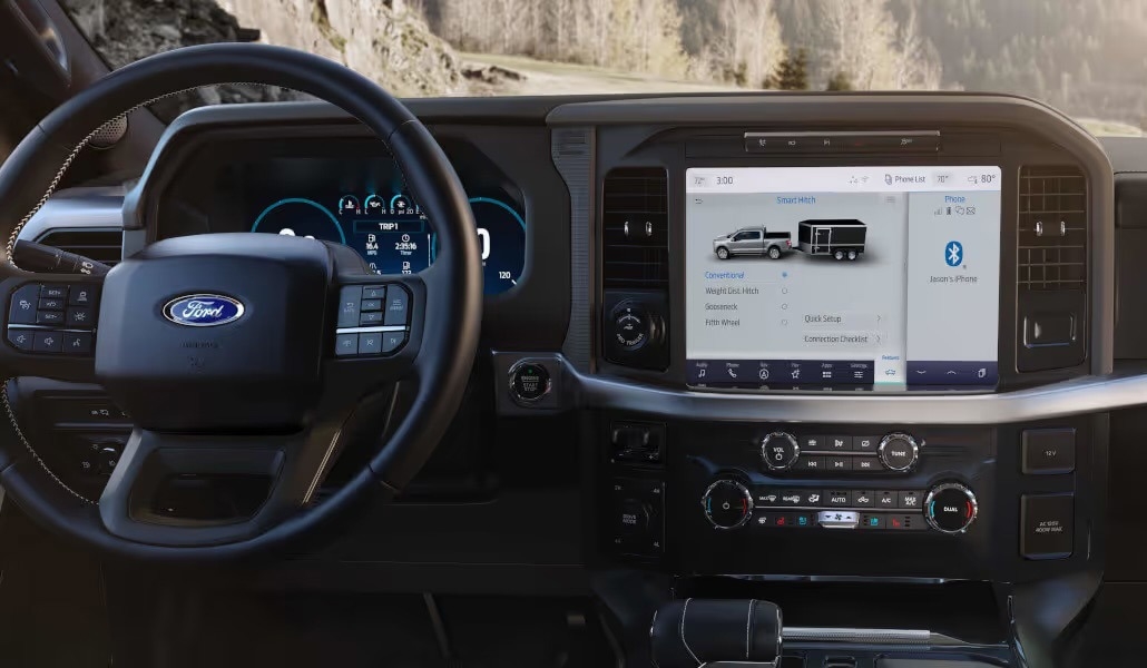 Interior dashboard of a modern Ford pickup truck showing the digital instrument cluster and touch screen