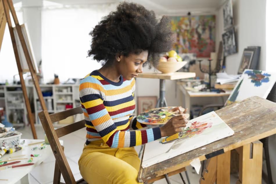 Woman painting in an art studio 