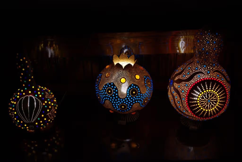 decorated gourds glowing in the dark