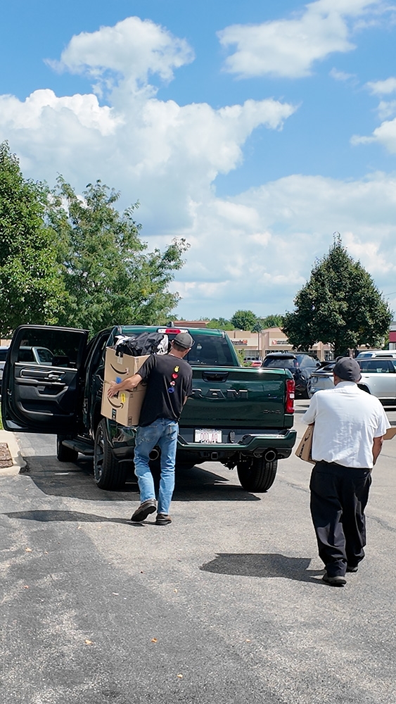 CDJR Naperville donation of supplies for Hesed House in Aurora