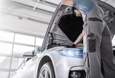 AutoPro Service Center collision repair technicians at work