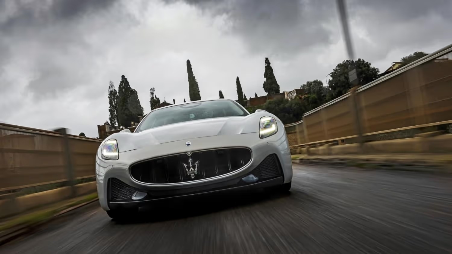 2024 Maserati GranTurismo driving in the country roads