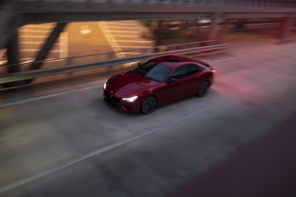 Maserati Ghibli in red in the city streets