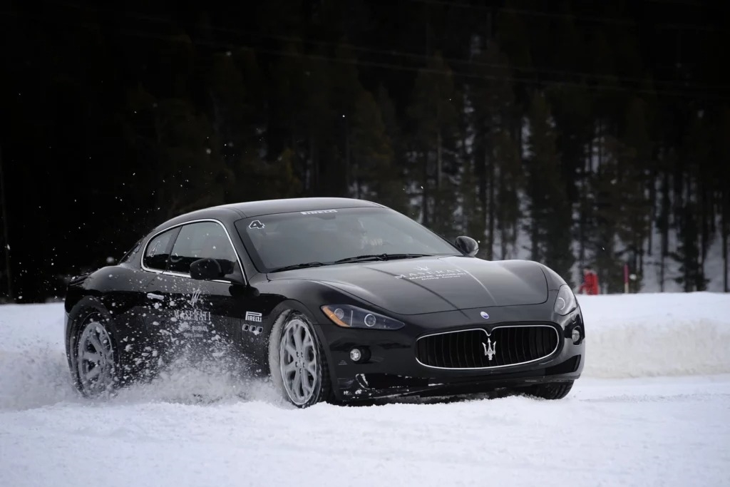 black Maserati on the snow