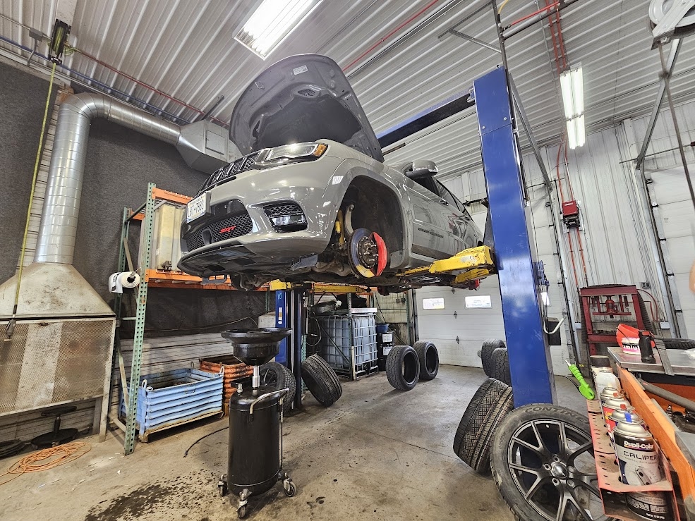 Vehicle receiving oil change service at New Generation Cars in Utica NY