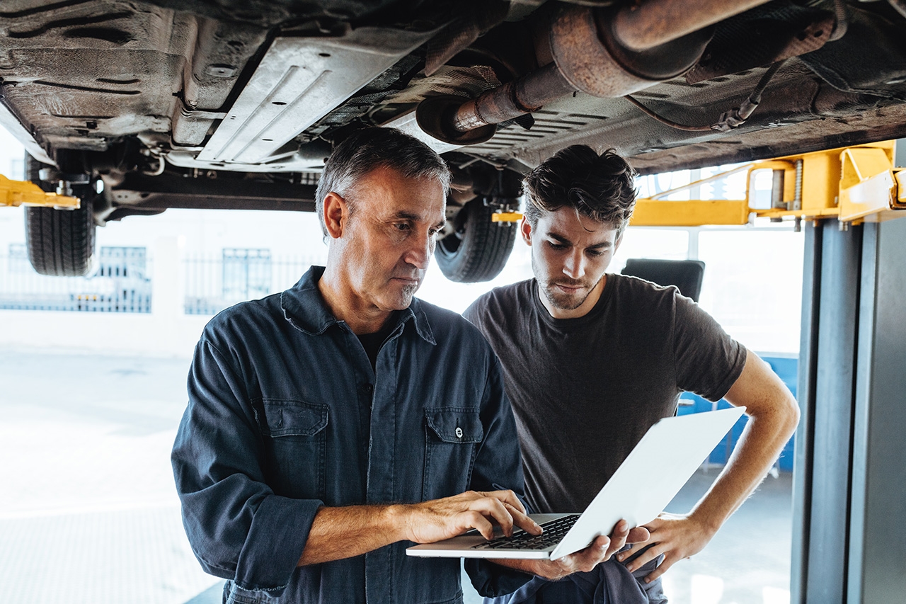 Factory-trained technician performing a multi-point inspection on a Certified Ready vehicle