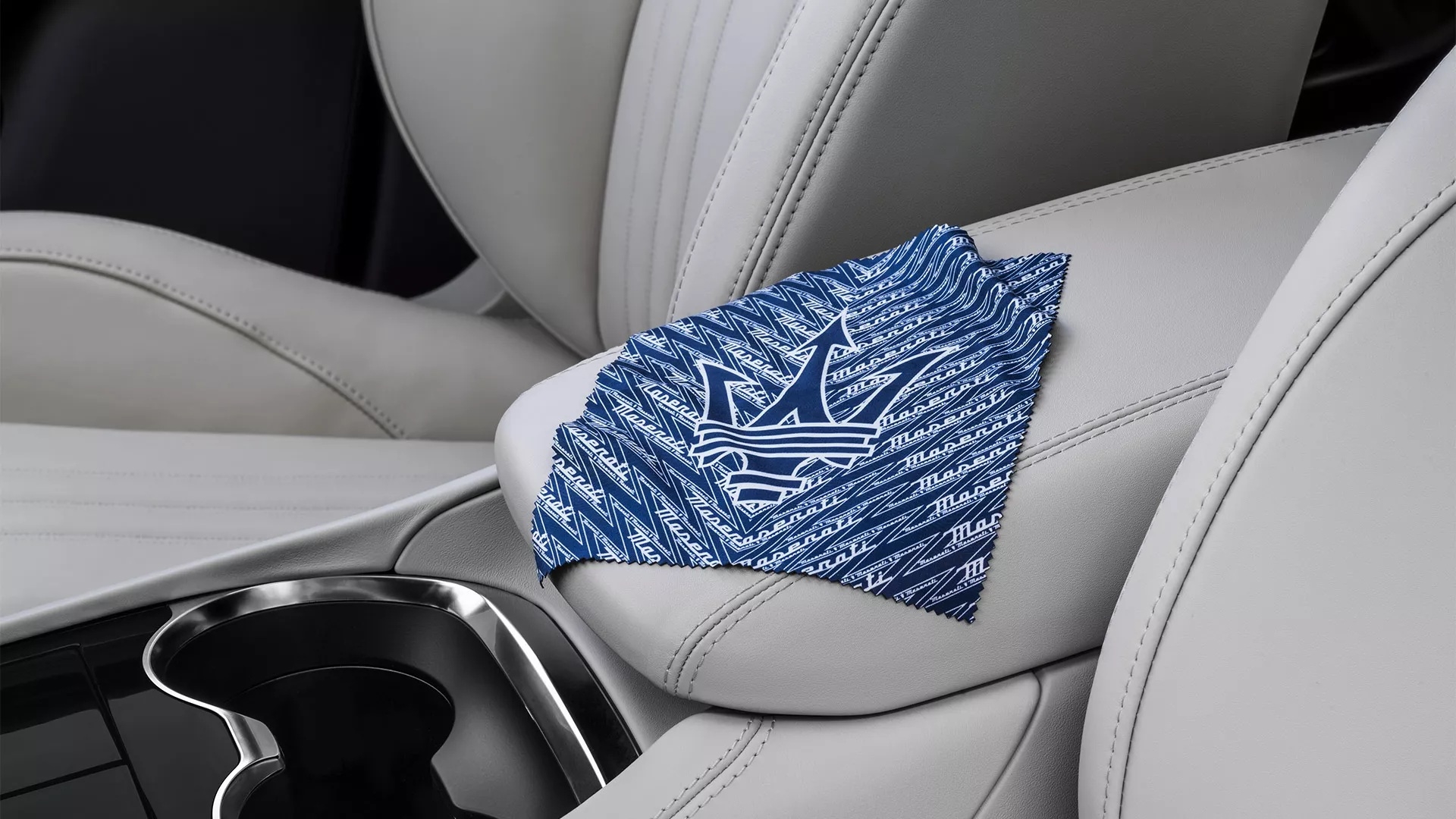 Microfiber cloth detailing a Maserati during a complimentary wash and vacuum in Edison, NJ