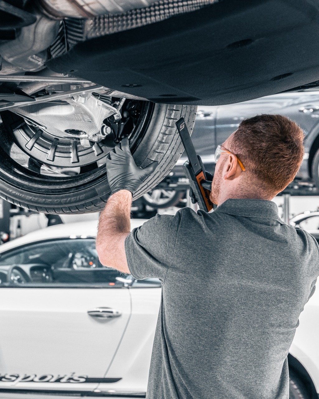 Bentley-trained technician performing a multipoint diagnostic inspection at Bentley Edison on US Route 1 in Edison, NJ