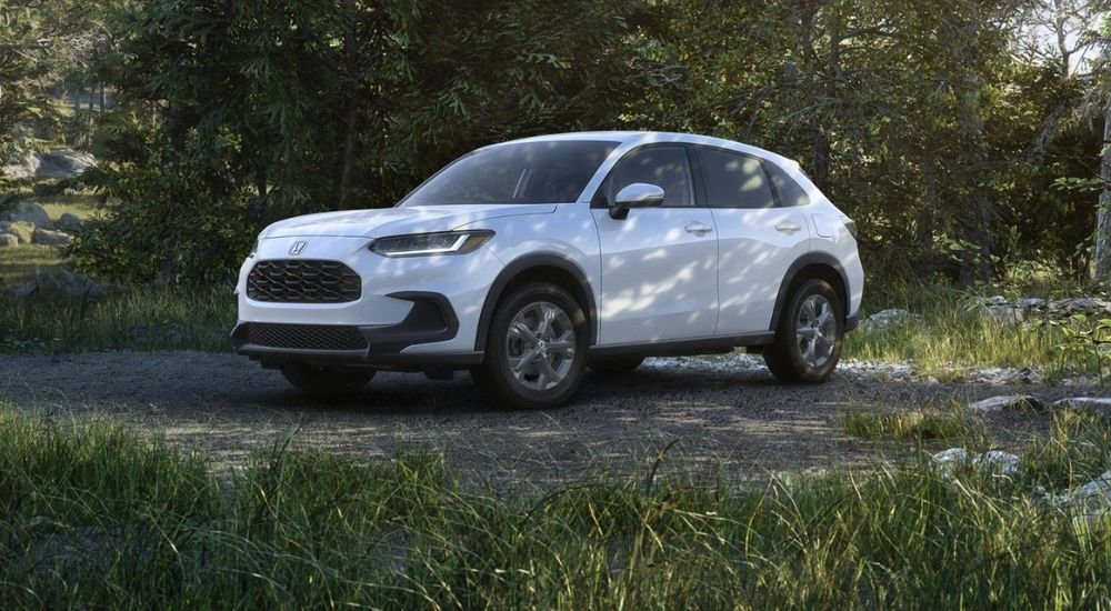 A white 2027 Honda HR-V LX shown parked off-road.