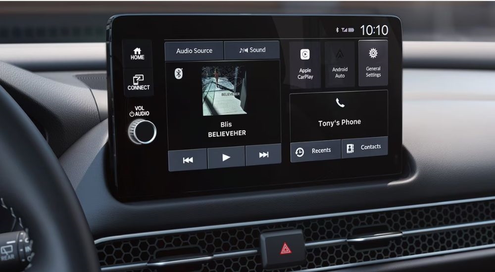 Infotainment display shown on a 2027 HR-V EX-L with black leather.
