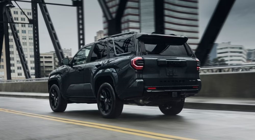 A gray 2026 Toyota 4Runner Platinum driving over a bridge.