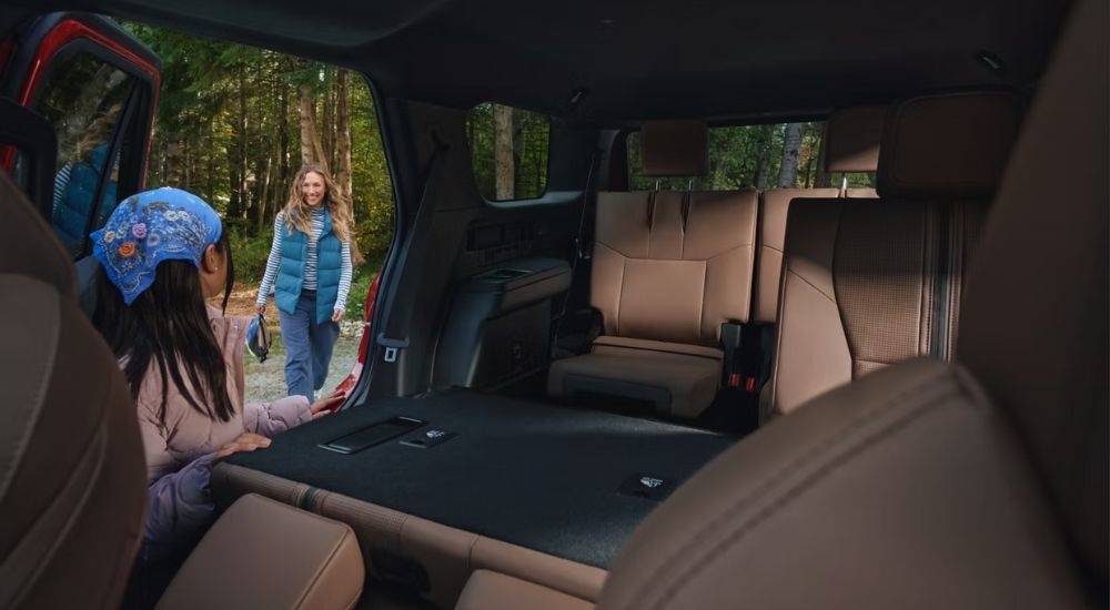 Tan interior with 2nd row being folded down in a 2026 Toyota 4Runner Limited.