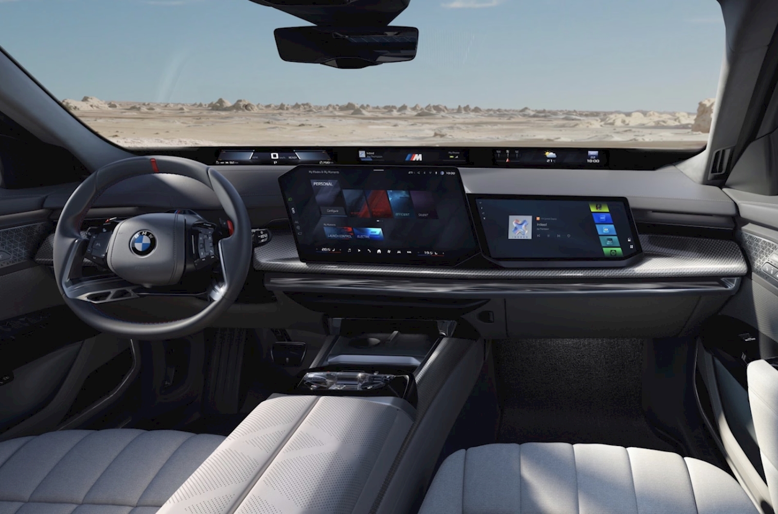 2027 BMW 7 Series interior with BMW Panoramic iDrive curved display and central touchscreen