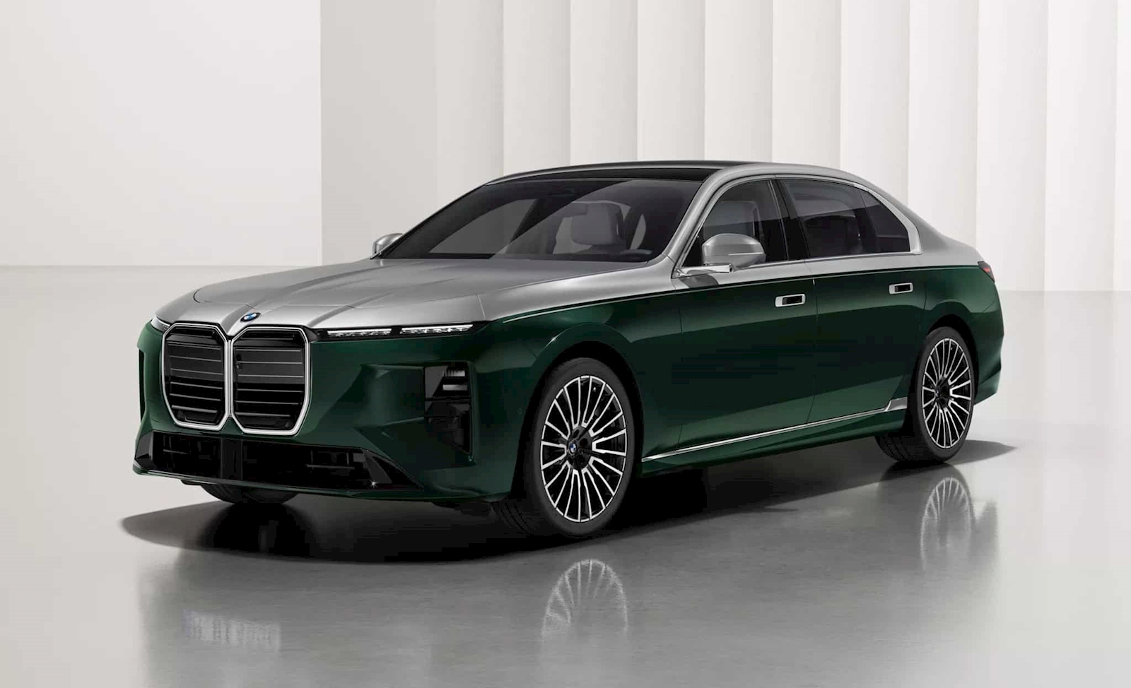 2027 BMW 7 Series in a two-tone green and silver finish, side profile, at BMW of Darien in Darien, CT