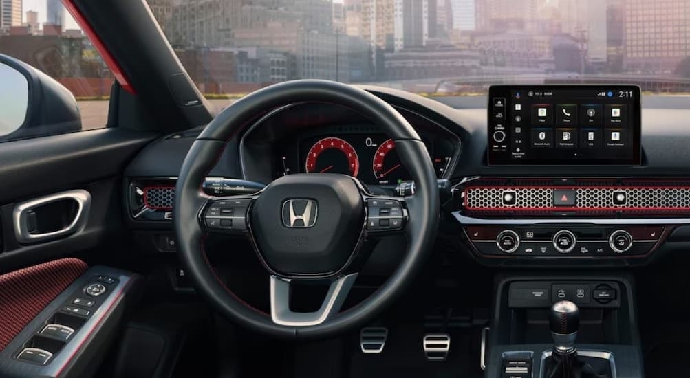 Black and red dash in a 2026 Honda Civic.