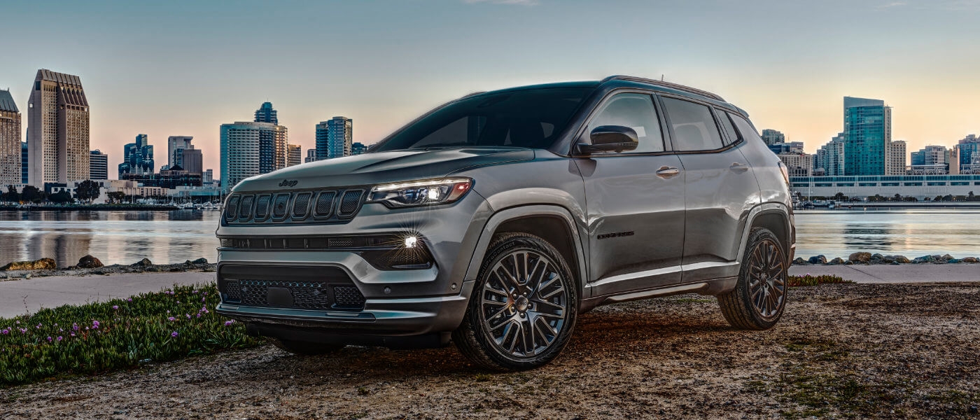 2026 Jeep Compass parked in front of city