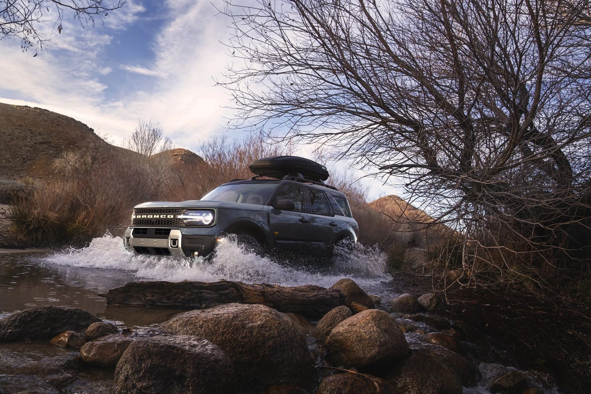 2026 Ford Bronco Sport crossing a shallow river on a trail