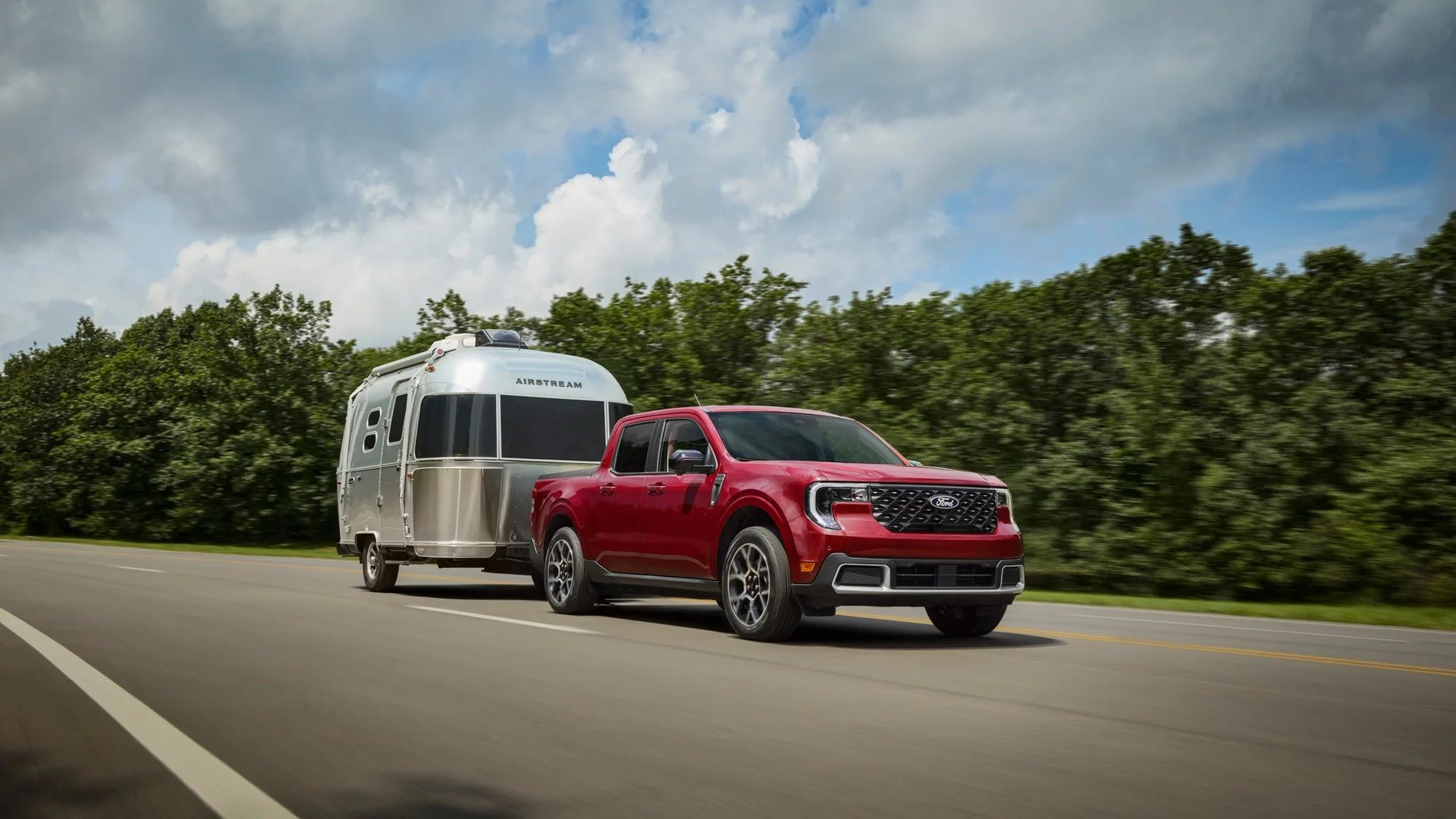 2026 Ford Maverick towing a small camper trailer