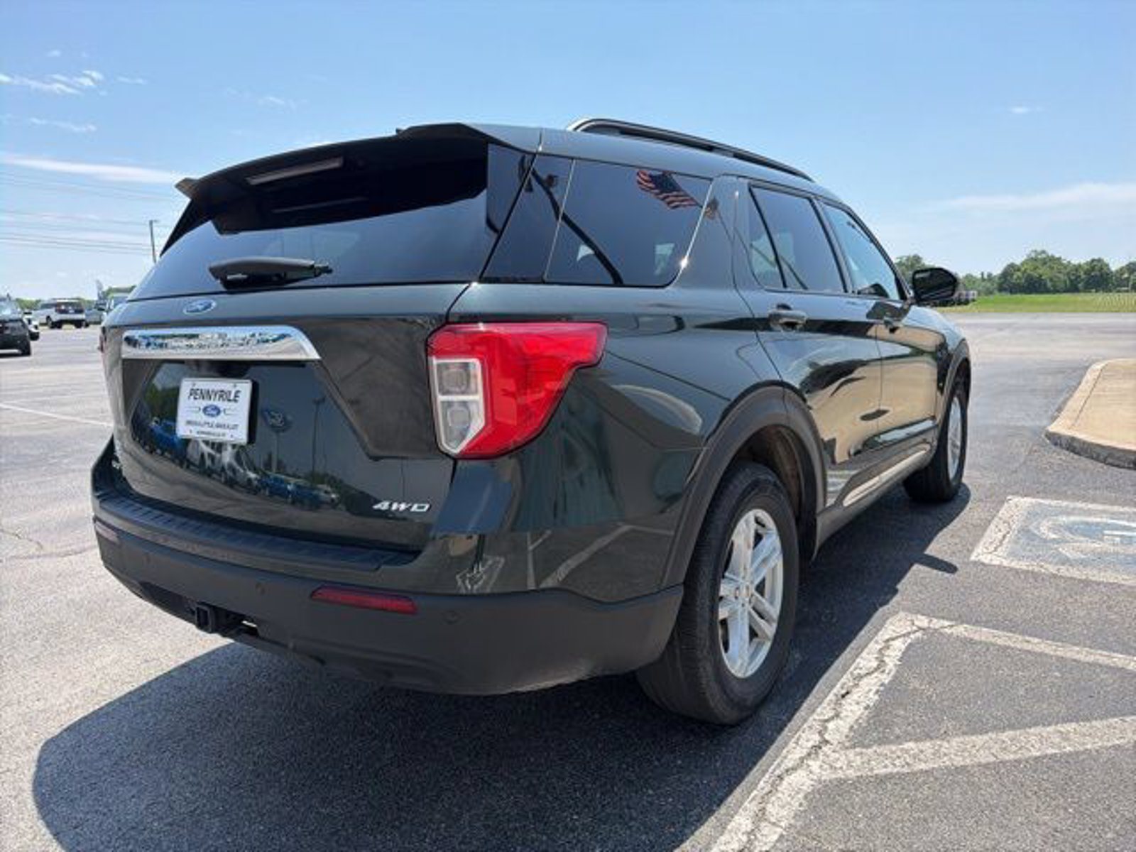 Rear three-quarter view of a used 2024 Ford Explorer XLT at Pennyrile Ford