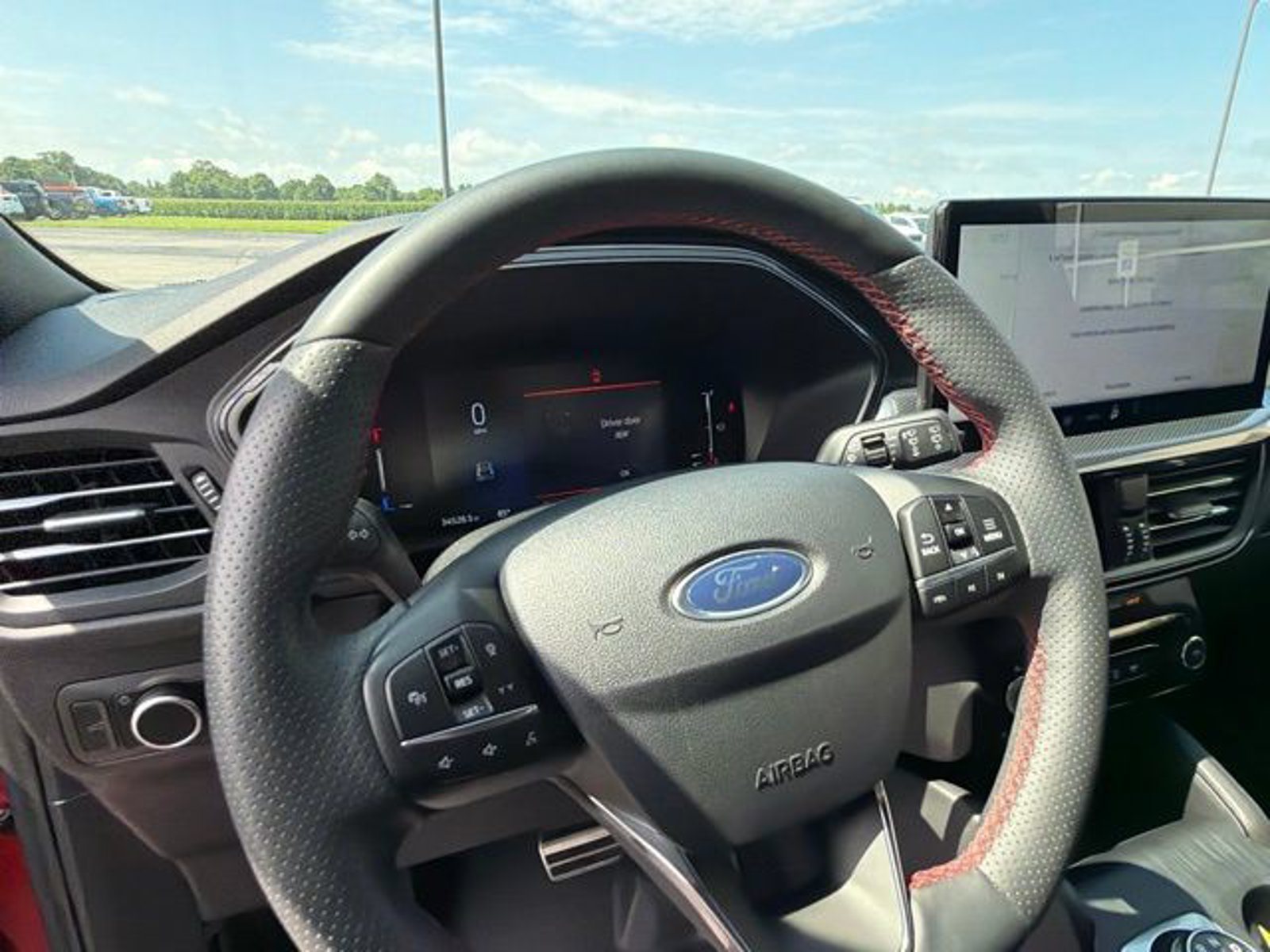 Front seats and dashboard of a used 2024 Ford Escape ST-Line
