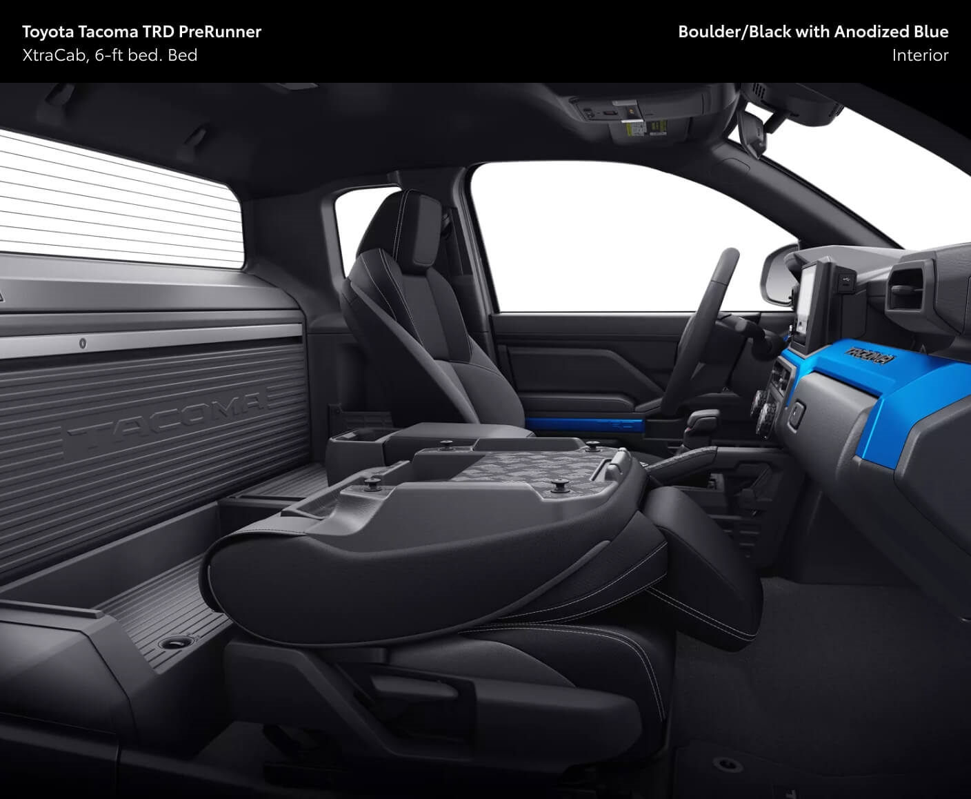Interior view of a 2026 Toyota Tacoma TRD PreRunner XtraCab showing the two-seater cabin configuration in Boulder/Black with Anodized Blue interior.
