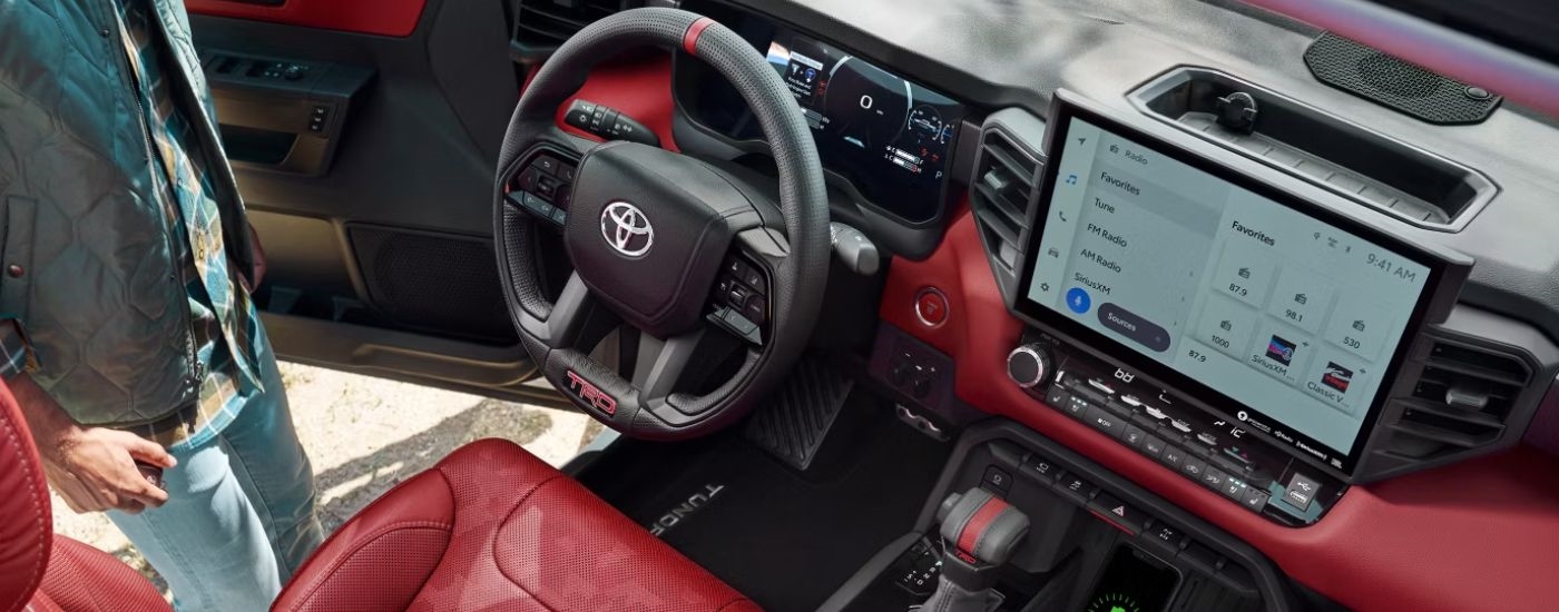 Red and black interior of a 2026 Toyota Tundra TRD Pro CrewMax.